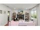 Cozy living room with fireplace, comfortable seating, and lots of natural light at 814 Jefferson Ave, Lakeland, FL 33801