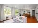 Bright living room featuring tile floors, large windows, and comfortable seating at 814 Jefferson Ave, Lakeland, FL 33801