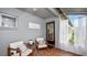 Relaxing outdoor porch with neutral tones and access to the backyard at 814 Jefferson Ave, Lakeland, FL 33801