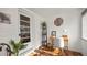 Bright sunroom with brick walls, round window, a view of the outside and natural light at 814 Jefferson Ave, Lakeland, FL 33801