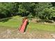 Expansive backyard featuring a charming red bridge that adds a touch of whimsy at 830 Miami Springs Dr, Longwood, FL 32779