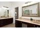 Spacious bathroom with double vanity and vanity area featuring granite counters at 830 Miami Springs Dr, Longwood, FL 32779