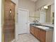 Well-maintained bathroom offering a glass enclosed shower and ample vanity space at 830 Miami Springs Dr, Longwood, FL 32779