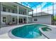 Exterior back of home featuring a pool, patio and balcony at 830 Miami Springs Dr, Longwood, FL 32779
