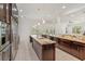 Modern kitchen with granite countertops, large island, and stainless steel appliances at 830 Miami Springs Dr, Longwood, FL 32779