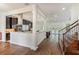Open concept layout from the living room showcases the kitchen and staircase at 830 Miami Springs Dr, Longwood, FL 32779
