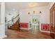 Bright and airy living room with staircase and French doors leading to the outdoor space at 830 Miami Springs Dr, Longwood, FL 32779