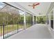 Expansive screened porch with fans and pool view at 830 Miami Springs Dr, Longwood, FL 32779