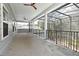 Expansive screened-in porch is perfect for enjoying the outdoors while being protected from insects at 830 Miami Springs Dr, Longwood, FL 32779