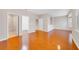 Bright bedroom with hardwood floors and neutral walls, offering a spacious and airy atmosphere at 8414 Frescada Ct, Orlando, FL 32836