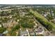 Elevated view features a golf community near a busy highway with the city in the distance at 849 Driver Ave, Winter Park, FL 32789