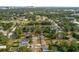 Scenic aerial view featuring homes nestled amidst lush greenery near a golf course at 849 Driver Ave, Winter Park, FL 32789