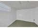 Unfinished basement area provides storage, with an accent wall at 849 Driver Ave, Winter Park, FL 32789