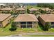 Aerial view of residential community with lush green lawns and tile roofs at 8990 Azalea Sands Ln # 8990, Davenport, FL 33896