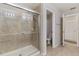 This bathroom features a tiled shower with glass doors and a separate toilet room at 976 Eagle Bay St, Winter Springs, FL 32708