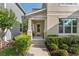 Inviting front porch with traditional design, featuring well-manicured bushes and a comfortable seating area at 976 Eagle Bay St, Winter Springs, FL 32708