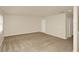 Neutral carpeted bedroom with good natural light and a closet at 9836 Old Patina Way, Orlando, FL 32832