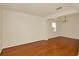 Spacious living room with recessed ceiling detail and natural light from a bright window at 9836 Old Patina Way, Orlando, FL 32832