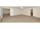 Spacious main bedroom featuring neutral carpet and an ensuite bathroom at 9836 Old Patina Way, Orlando, FL 32832