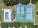 Overhead view of the community pool and sports courts, highlighting recreational opportunities near the property at 10249 Spring Lake Dr, Clermont, FL 34711