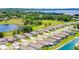 A stunning aerial showcases the neighborhood's lush landscaping, serene lakes, and well-maintained homes at 10249 Spring Lake Dr, Clermont, FL 34711