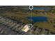 Stunning aerial view of a two-story home with well-manicured lawn near a serene lake at 10249 Spring Lake Dr, Clermont, FL 34711