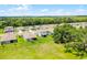 A charming neighborhood showcasing an aerial view of a home at 10249 Spring Lake Dr, Clermont, FL 34711