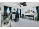 Well-lit home office with a standing desk, an ergonomic chair, and relaxing inversion table at 10249 Spring Lake Dr, Clermont, FL 34711