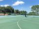 Well-maintained community tennis and pickleball courts, perfect for recreation and exercise at 10249 Spring Lake Dr, Clermont, FL 34711