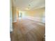 Spacious living room featuring neutral carpeting and wainscoting along the walls at 10506 Green Ivy Lane, Orlando, FL 32832