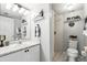 Bathroom featuring modern fixtures, updated vanity, and walk-in shower, creating a relaxing and functional space at 10664 Spring Buck Trl, Orlando, FL 32825