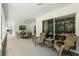 Spacious outdoor patio with furniture, providing a comfortable area for relaxation and enjoying the outdoors at 10664 Spring Buck Trl, Orlando, FL 32825
