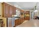 Image shows the kitchen with stainless steel appliances, granite countertops and lots of cabinet space at 1090 Braddock Rd, Deltona, FL 32725