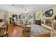 Cozy living room featuring hardwood floors, fireplace, and stylish decor at 1090 Braddock Rd, Deltona, FL 32725