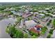 Nice aerial view of lakefront buildings and surrounding landscape near downtown area at 1101 Rush Ct, Celebration, FL 34747