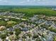 Beautiful aerial view showcasing the property location in a community with lush greenery and serene water features at 1101 Rush Ct, Celebration, FL 34747