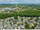 Aerial shot of a home near Disney World, highways and nature trails, showcasing its prime location at 1101 Rush Ct, Celebration, FL 34747