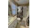 Bathroom featuring a shower/tub, toilet, and a single sink at 1101 Rush Ct, Celebration, FL 34747
