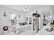 Bright bedroom with a white desk, a chair, and windows that let in natural light with themed decor at 1101 Rush Ct, Celebration, FL 34747