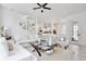 Open-concept living room showcasing decor, staircase, and seamless flow to the kitchen at 1101 Rush Ct, Celebration, FL 34747