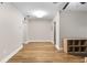 Spacious living room featuring hardwood floors, a ceiling fan and neutral wall paint at 1140 S Orlando Ave # E11, Maitland, FL 32751