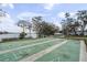 Numerous shuffleboard courts surrounded by views of nature and waterfront at 1140 S Orlando Ave # E11, Maitland, FL 32751