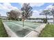 Multiple shuffleboard courts surrounded by a view of a lake in the background at 1140 S Orlando Ave # E11, Maitland, FL 32751