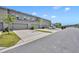 New townhome featuring an attached garage and modern architectural details in a Gathering-friendly community at 11574 Buoy Point Pl, Orlando, FL 32832