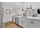 Bright and airy kitchen with stainless steel appliances, quartz countertops, and an open design at 11574 Buoy Point Pl, Orlando, FL 32832