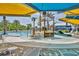 Community splash pad and pool featuring playful water features for children and comfortable lounge seating at 11574 Buoy Point Pl, Orlando, FL 32832