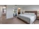 Spacious bedroom with mirrored closet, plush carpet, and calming decor at 11631 Mystery Ln, Orlando, FL 32832