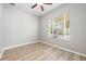 A bright bedroom with vinyl flooring and a large window offering lots of natural light at 124 Mcleods Way, Winter Springs, FL 32708