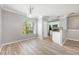 Bright dining area with a window, pendant lighting, and an open view to the kitchen at 124 Mcleods Way, Winter Springs, FL 32708