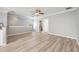 Spacious living room featuring wood floors, neutral decor, and lots of natural light at 124 Mcleods Way, Winter Springs, FL 32708